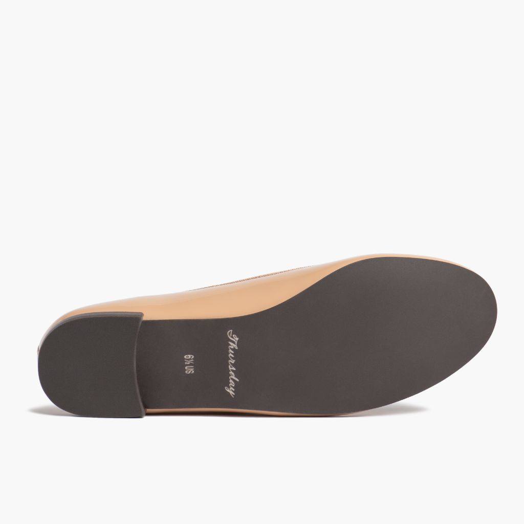 https://cdn.shopify.com/s/files/1/0419/1525/files/1024x1024-Wmn-TinyDancer-BuffPatent-020226-Outsole_622786d5-a5f2-4761-91a6-6654858e73fc.jpg?v=1773097473