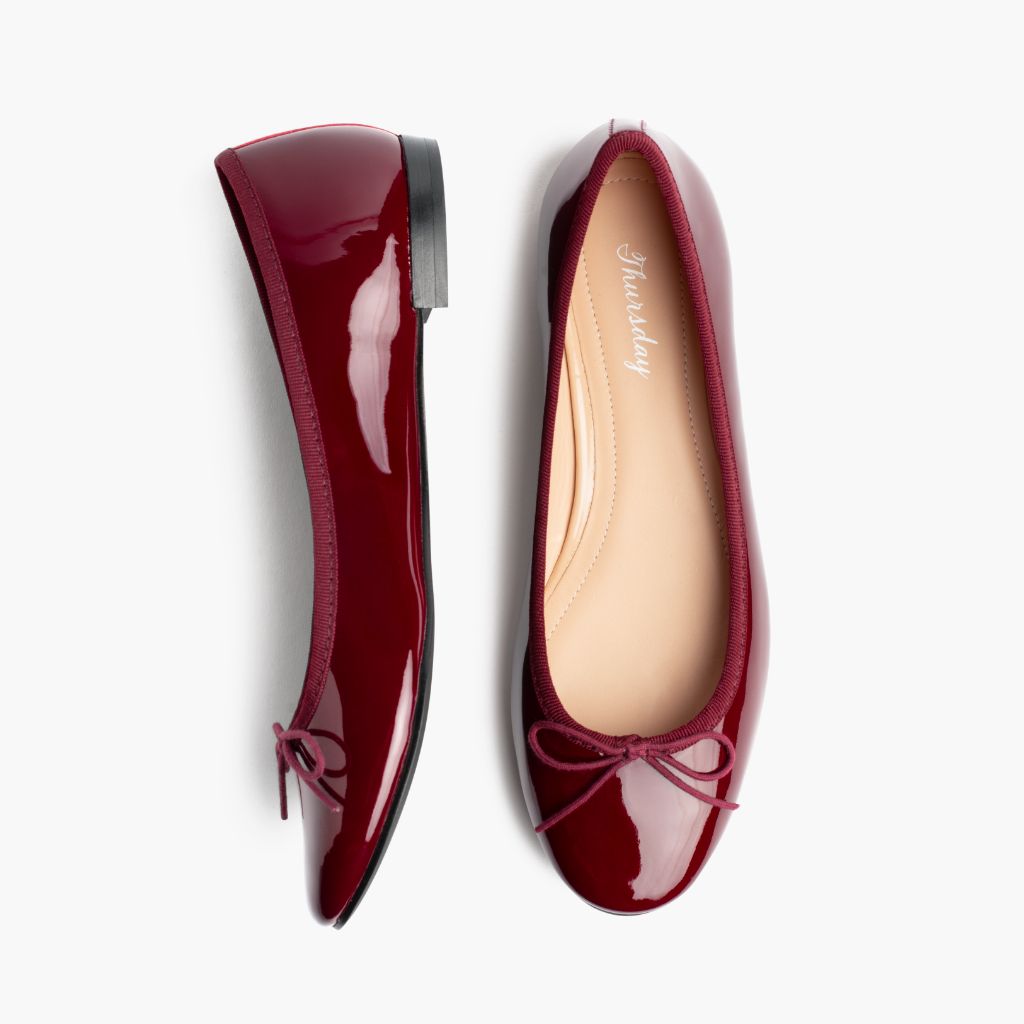 https://cdn.shopify.com/s/files/1/0419/1525/files/1024x1024-Wmn-TinyDancer-BurgundyPatent-020226-Flatlay1_eb2a8cfc-b6e9-4aef-9fbe-6100a3dd2302.jpg?v=1773097363
