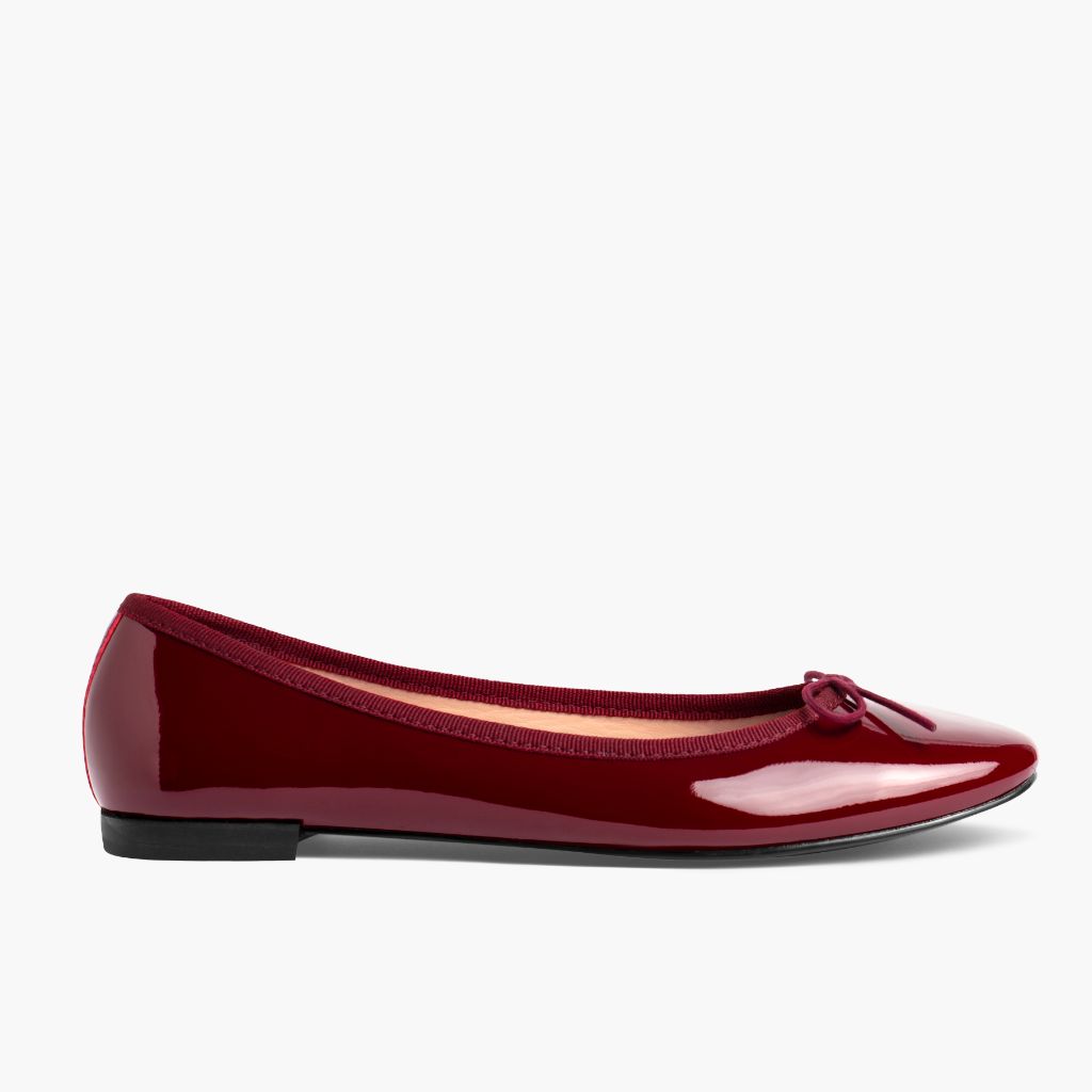 https://cdn.shopify.com/s/files/1/0419/1525/files/1024x1024-Wmn-TinyDancer-BurgundyPatent-020226-Side_8aeddc30-eb30-4004-baa8-64582006f3c5.jpg?v=1773097363