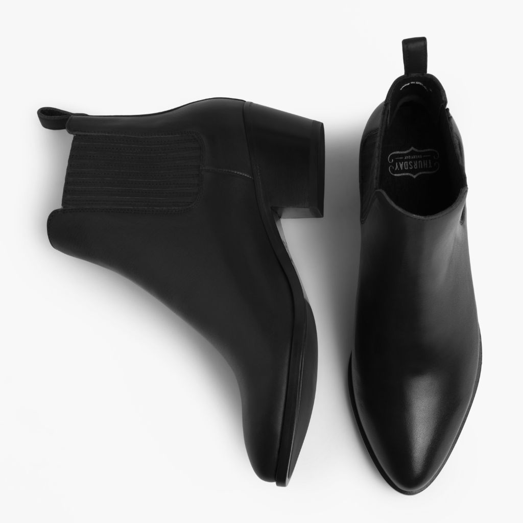 https://cdn.shopify.com/s/files/1/0419/1525/products/1024x1024-Women-Dreamer-Bootie-Black-Leather-061022-Flatlay.jpg?v=1658514079