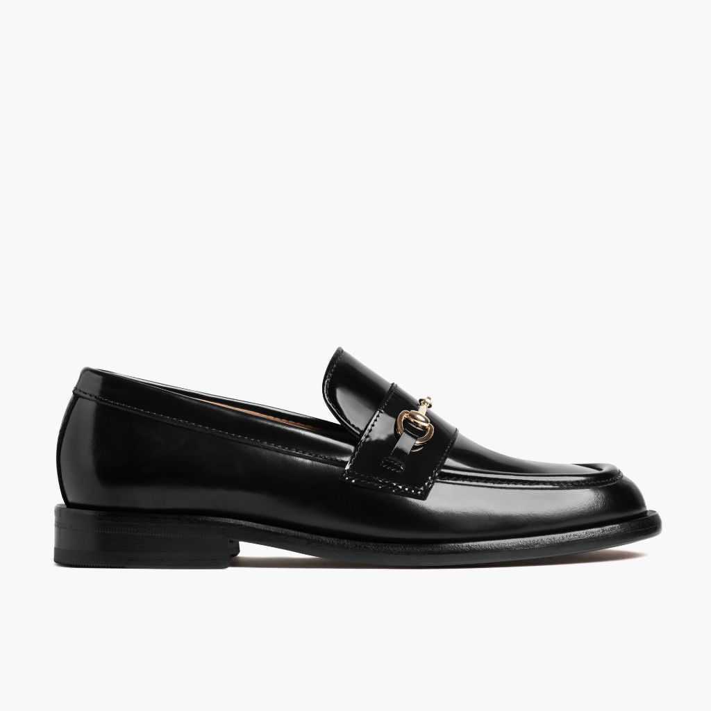 https://cdn.shopify.com/s/files/1/0419/1525/files/1024x1024-Women-DressPenny-BlackGold-021024-Side.jpg?v=1746031298