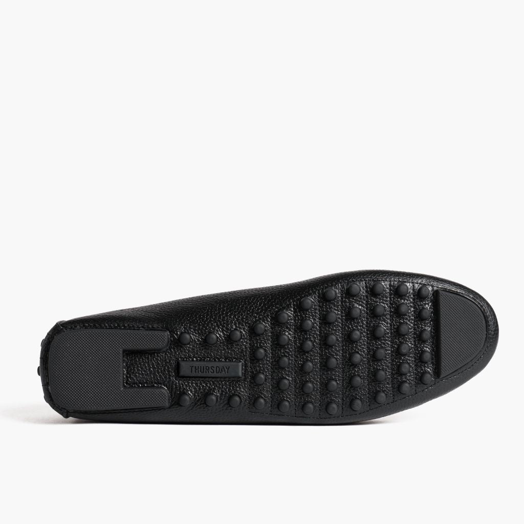https://cdn.shopify.com/s/files/1/0419/1525/files/1024x1024-Women-DrivingLoafer-BlackGold-062524-Outsole.jpg?v=1757957628