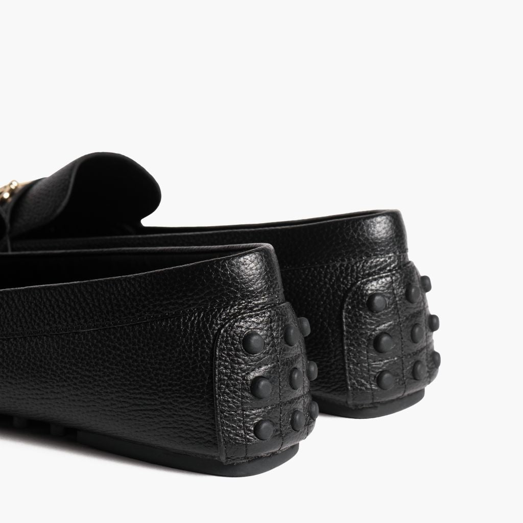 https://cdn.shopify.com/s/files/1/0419/1525/files/1024x1024-Women-DrivingLoafer-BlackGold-062524-Rear.jpg?v=1757957628