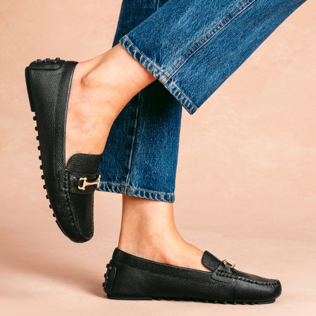 https://cdn.shopify.com/s/files/1/0419/1525/files/1024x1024-Women-DrivingLoafer-BlackGold-082025-2.jpg?v=1757956443