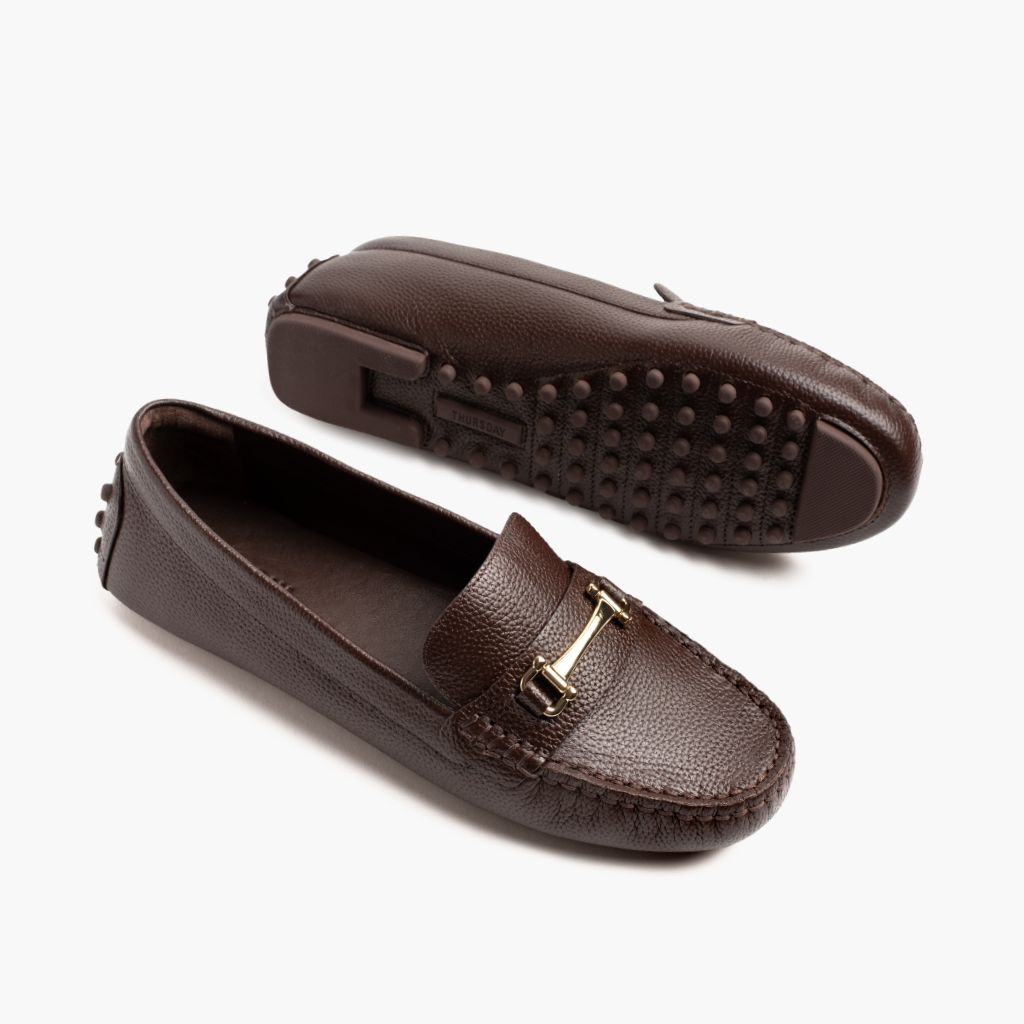 https://cdn.shopify.com/s/files/1/0419/1525/files/1024x1024-Women-DrivingLoafer-BrownGold-062524-FlatlayAlt.jpg?v=1757957673