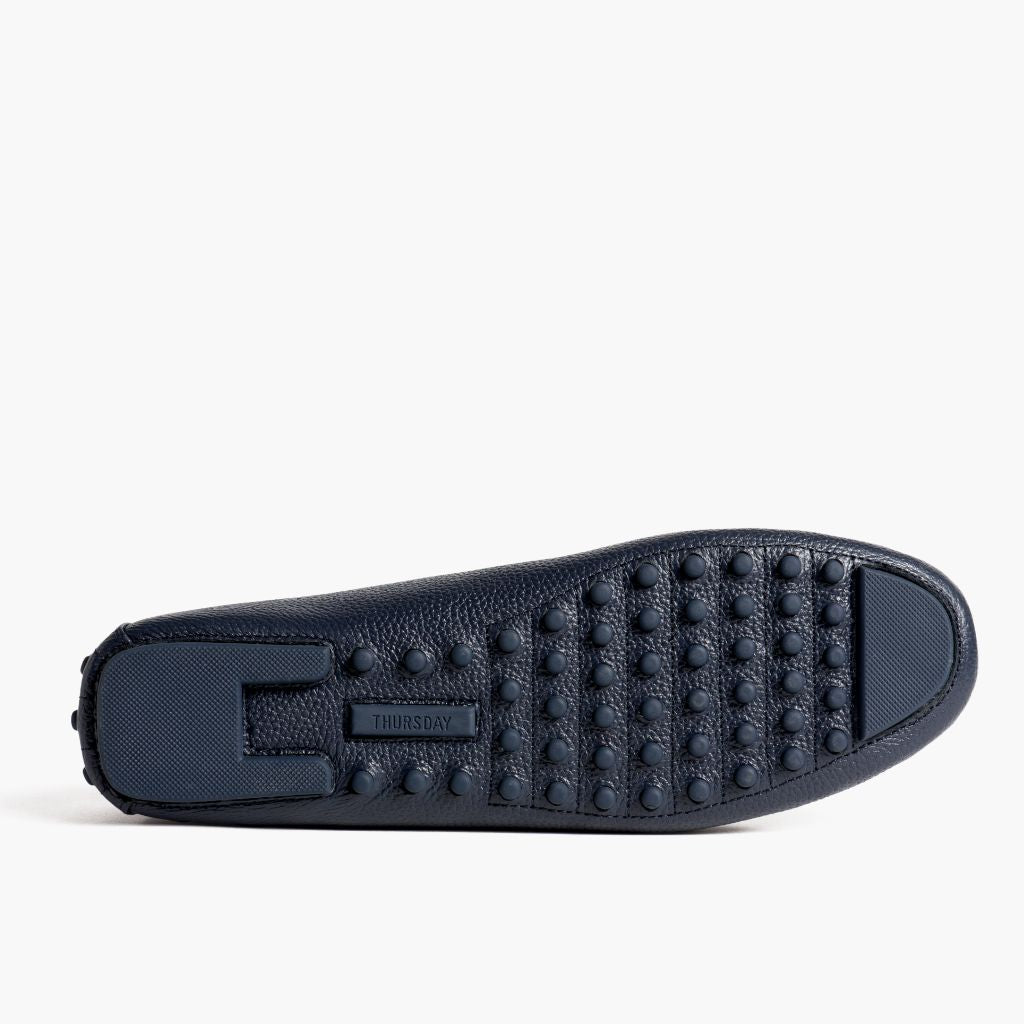 https://cdn.shopify.com/s/files/1/0419/1525/files/1024x1024-Women-DrivingLoafer-NavyGold-062524-Outsole.jpg?v=1757957649