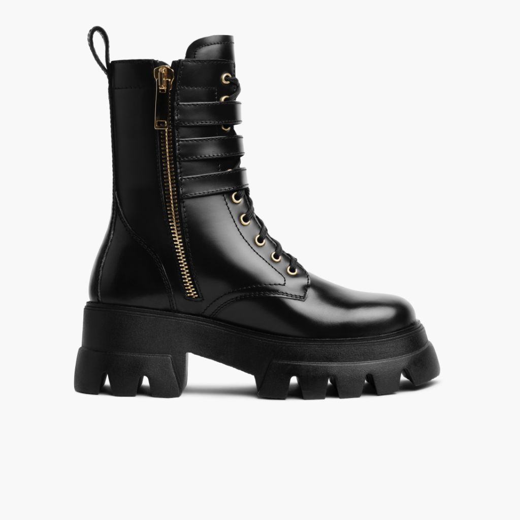 https://cdn.shopify.com/s/files/1/0419/1525/products/1024x1024-Women-Dynasty-Black_Gold-022522-SideZipper.jpg?v=1646694122