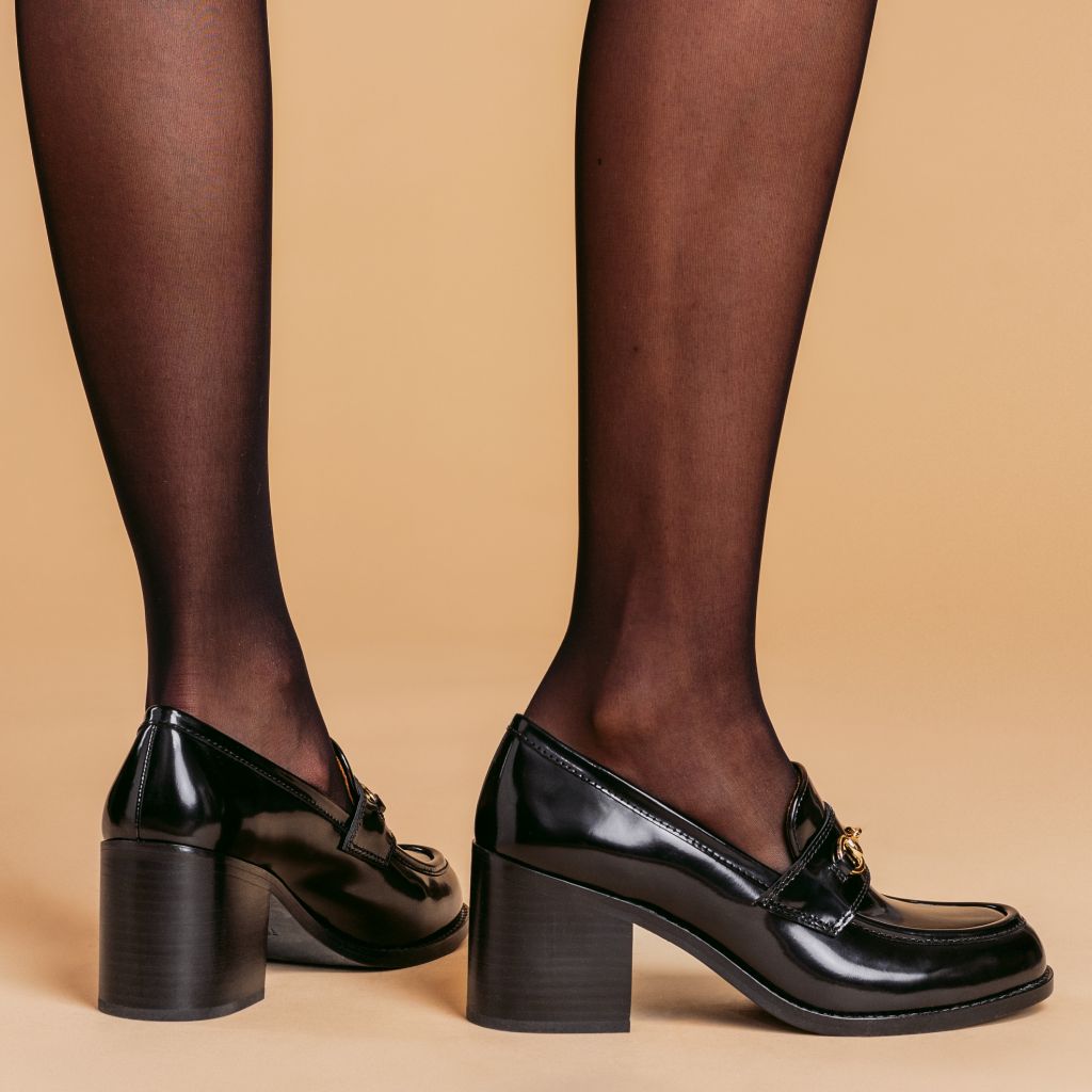 https://cdn.shopify.com/s/files/1/0419/1525/files/1024x1024-Women-HighHeelPenny-BlackGold-020425-2.jpg?v=1739893183