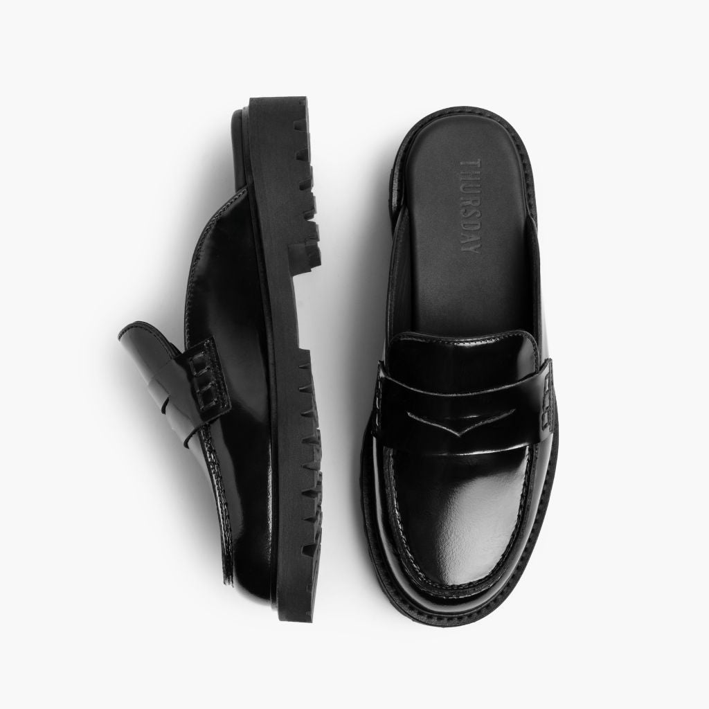 https://cdn.shopify.com/s/files/1/0419/1525/files/1024x1024-Women-PennyMule-Black-102324-Flatlay1_9648f3e8-ec6b-4793-aeda-042bbee24428.jpg?v=1730318347