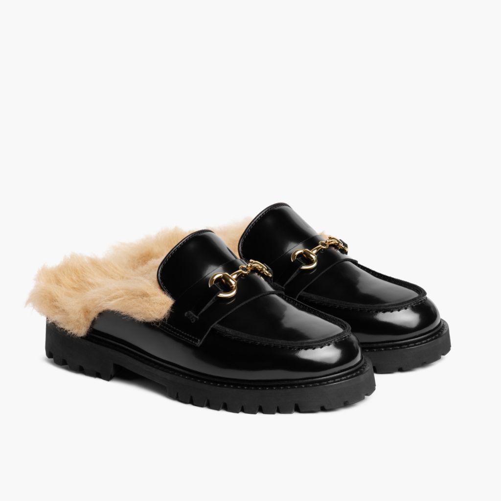https://cdn.shopify.com/s/files/1/0419/1525/files/1024x1024-Women-PennyMule-BlackBeigeShearling-070825-3.4.jpg?v=1757443850