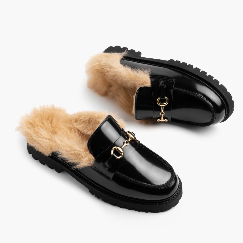https://cdn.shopify.com/s/files/1/0419/1525/files/1024x1024-Women-PennyMule-BlackBeigeShearling-070825-FlatlayAlt.jpg?v=1757443895