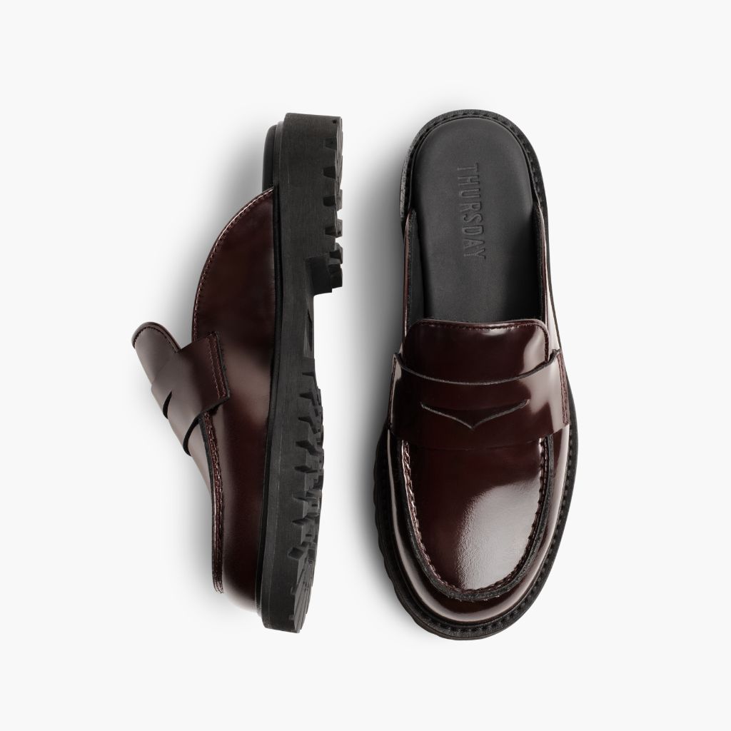 https://cdn.shopify.com/s/files/1/0419/1525/files/1024x1024-Women-PennyMule-Burgundy-102324-Flatlay1_5f58b8a2-e370-4e87-910f-0458abb87f1a.jpg?v=1730318411