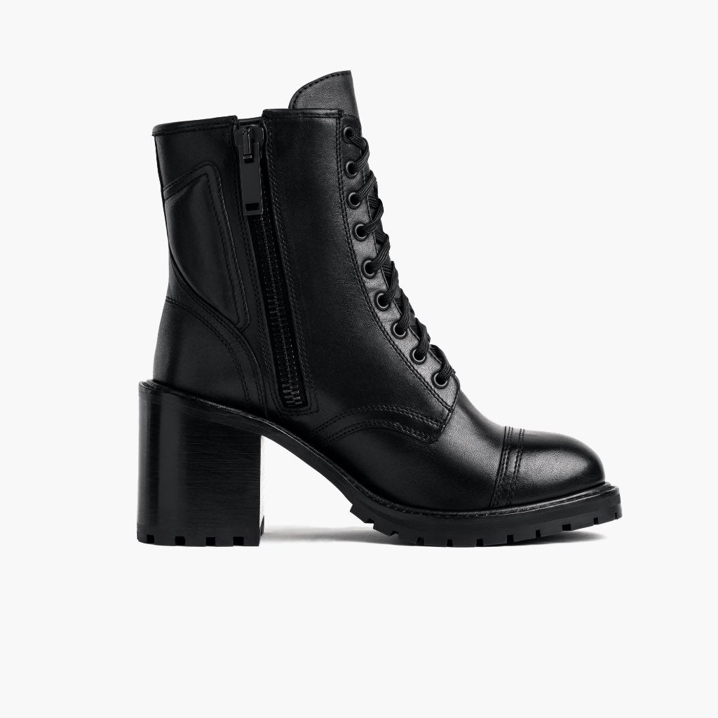 https://cdn.shopify.com/s/files/1/0419/1525/products/1024x1024-Women-Rebel-Black-081721-SideZipper.jpg?v=1630614464