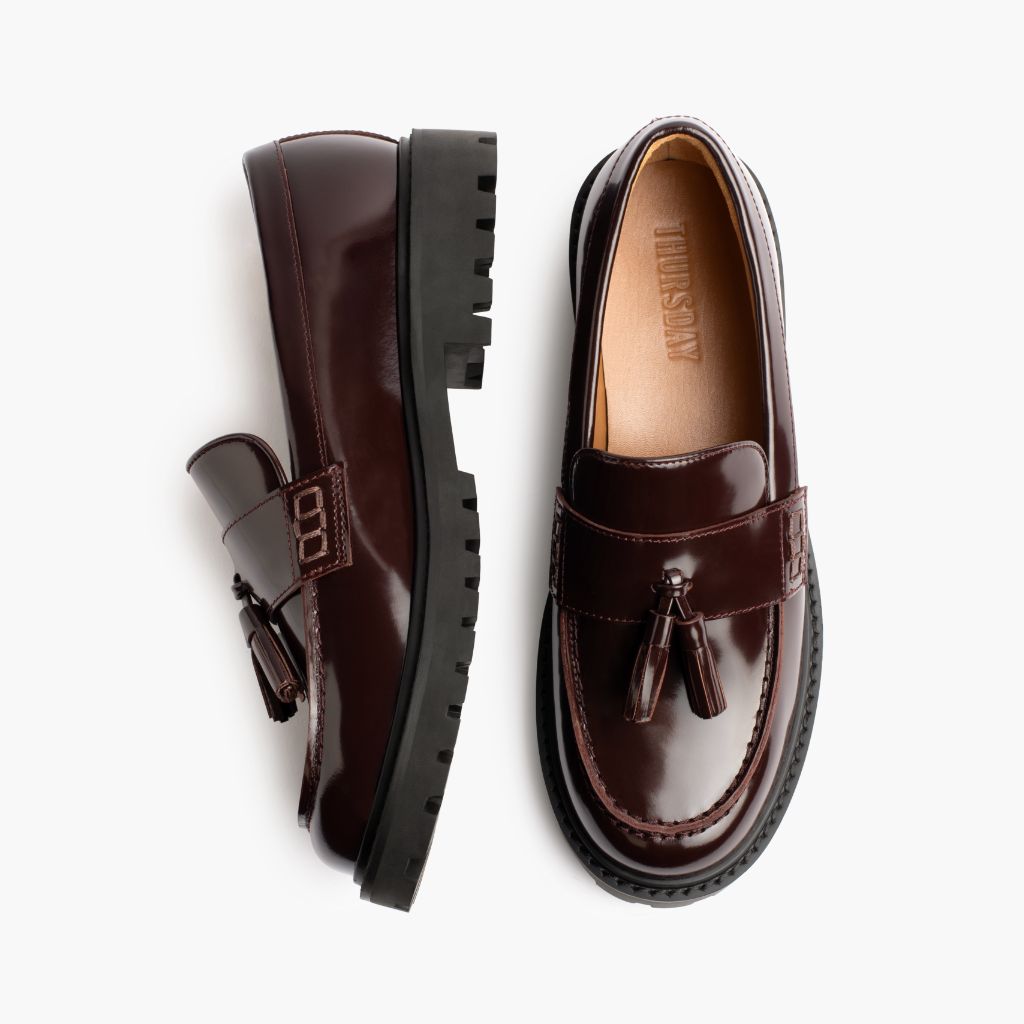 https://cdn.shopify.com/s/files/1/0419/1525/files/1024x1024-Women-TasselPenny-Burgundy-012226-Flatlay1.jpg?v=1771869040