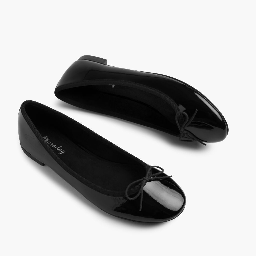 https://cdn.shopify.com/s/files/1/0419/1525/files/1024x1024-Women-TinyDancer-BlackPatent-081225-FlatlayAlt.jpg?v=1756309377