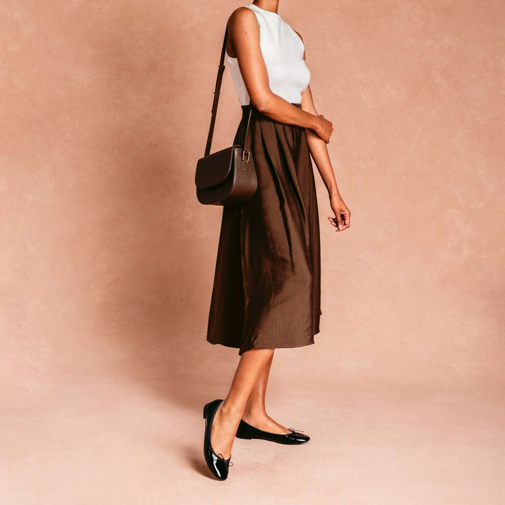 https://cdn.shopify.com/s/files/1/0419/1525/files/1024x1024-Women-TinyDancer-BlackPatent-082625-2.jpg?v=1756309086