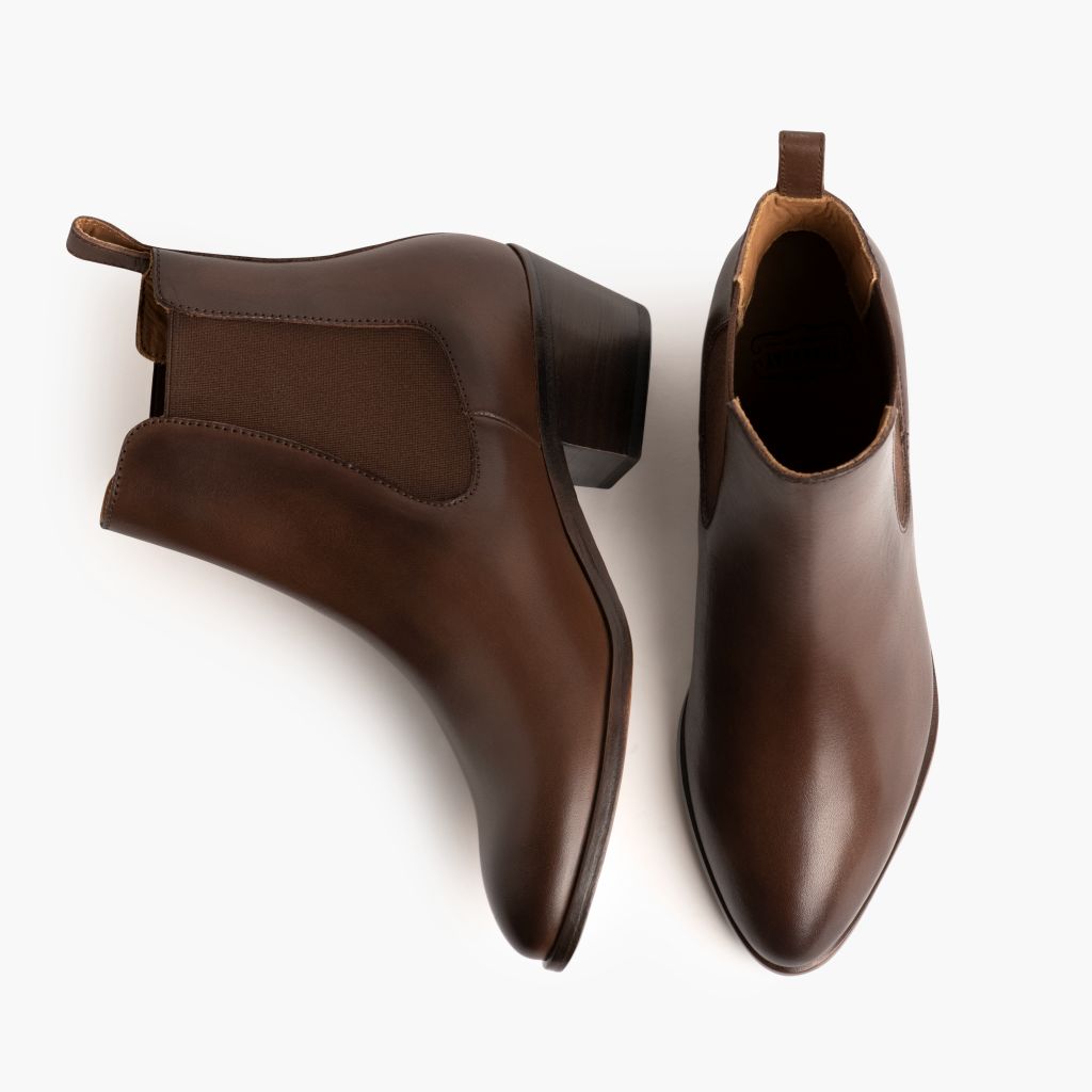 https://cdn.shopify.com/s/files/1/0419/1525/files/1024x1024-Womens-DuchessBootie-Amaretto-120623-Flatlay1.jpg?v=1702070002