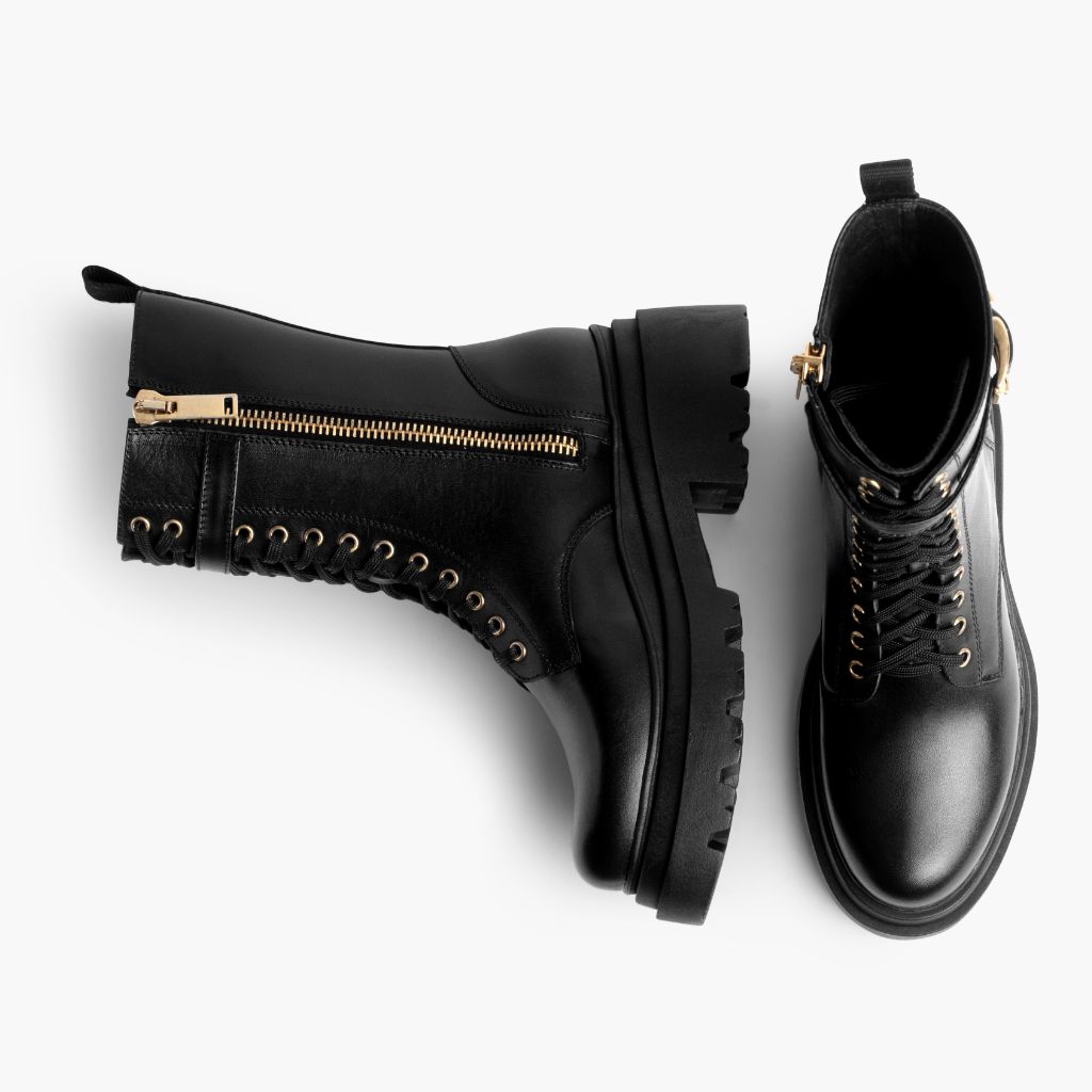 https://cdn.shopify.com/s/files/1/0419/1525/files/1024x1024-Womens-Fatale-BlackGold-100623-Flatlay1.jpg?v=1696965156