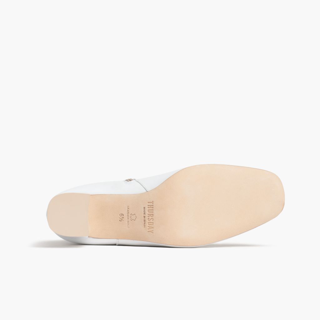 https://cdn.shopify.com/s/files/1/0419/1525/files/1024x1024-Womens-HighStandard-White-102423-Outsole.jpg?v=1698686558