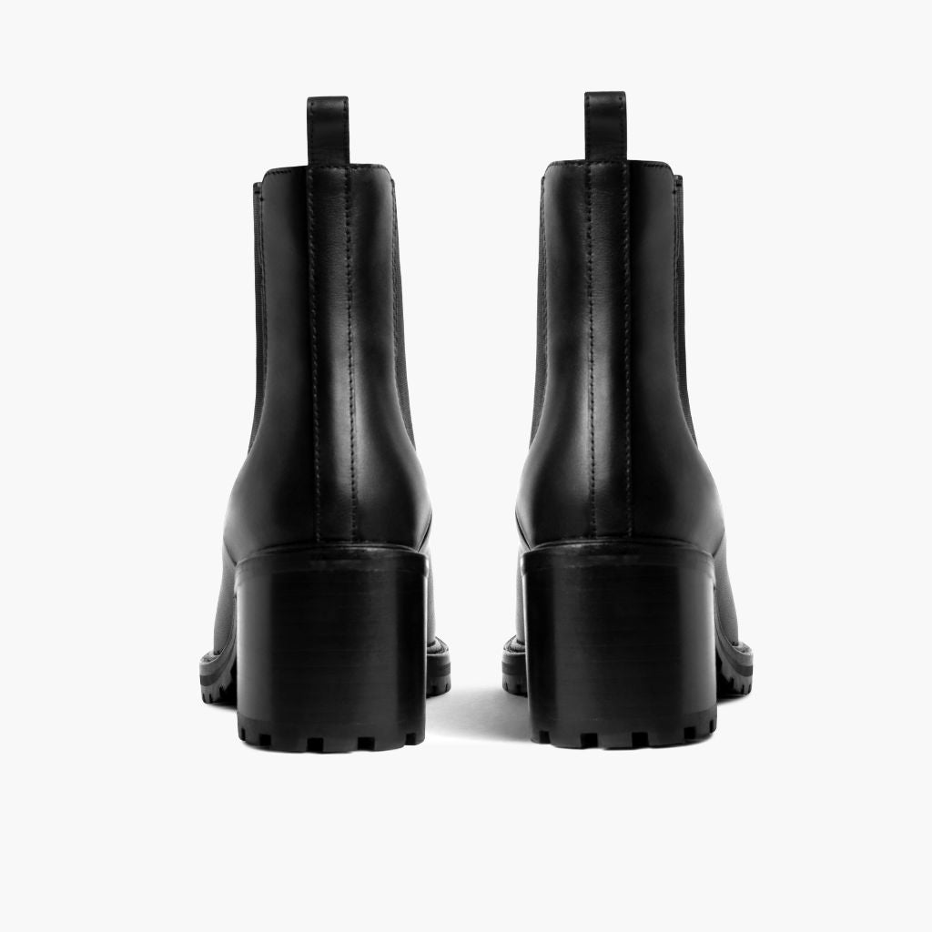 https://cdn.shopify.com/s/files/1/0419/1525/files/1024x1024-Womens-Knockout-Black-081523-Rear.jpg?v=1692639651