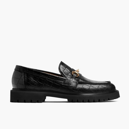 https://cdn.shopify.com/s/files/1/0419/1525/files/1024x1024-Womens-Penny-BlackCrocoGold-051324-Side.jpg?v=1718804392