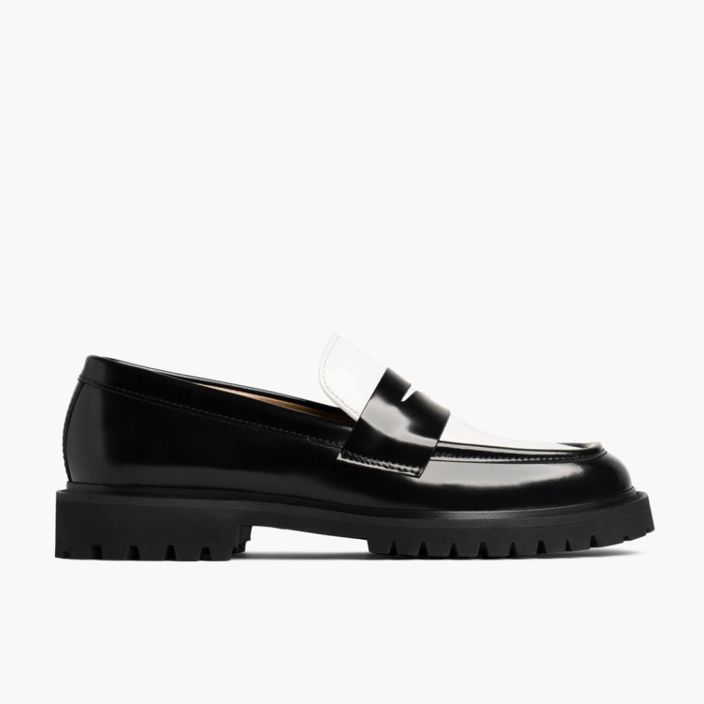 https://cdn.shopify.com/s/files/1/0419/1525/files/1024x1024-Womens-Penny-BlackWhite-051324-Side.jpg?v=1718804539