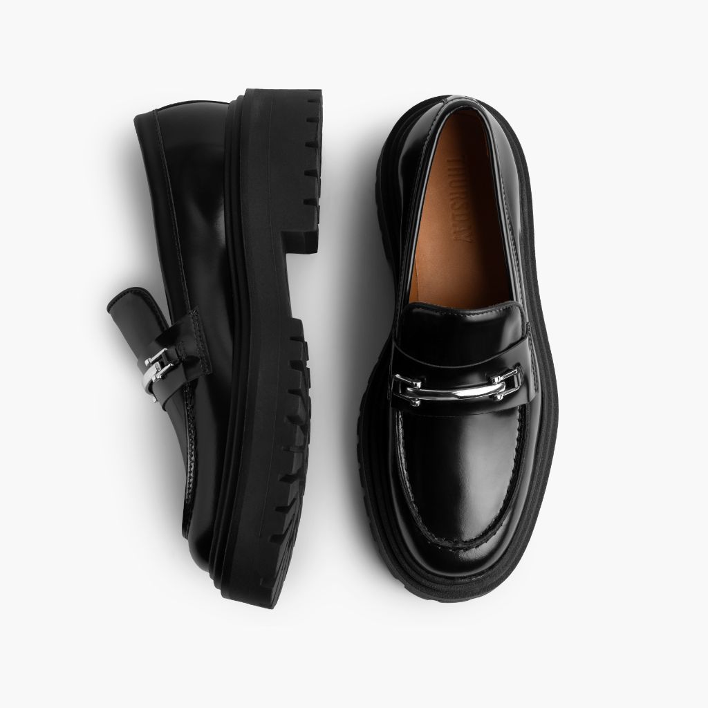 https://cdn.shopify.com/s/files/1/0419/1525/files/1024x1024-Womens-PennyPlatform-BlackSilver-051324-Flatlay1.jpg?v=1718808612