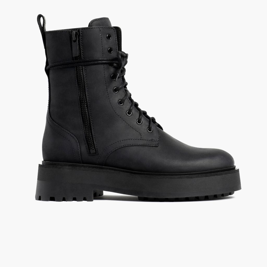 https://cdn.shopify.com/s/files/1/0419/1525/files/1024x1024-Womens-Quest-Black-082423-SideZip.jpg?v=1693948474