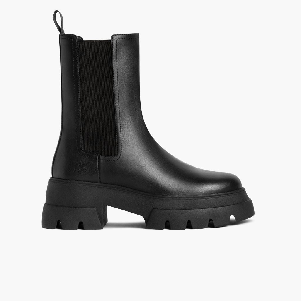 https://cdn.shopify.com/s/files/1/0419/1525/files/1024x1024-Womens-Reign-Black-112123-Side_24ac7bcb-393a-4ed0-9fcb-cb1cd4862bb2.jpg?v=1706741301