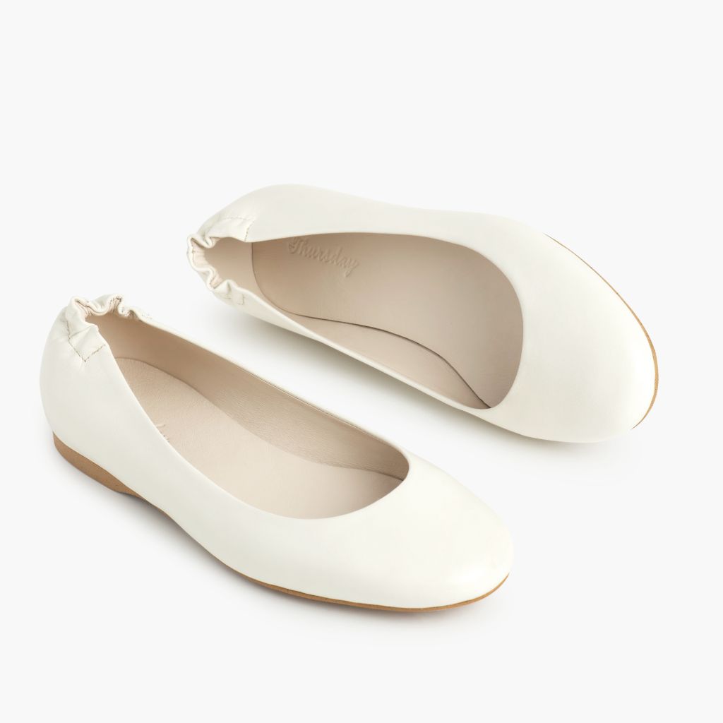 https://cdn.shopify.com/s/files/1/0419/1525/files/1024x1024-Womens-Scrunch-Ivory-052523-FlatlayAlt.jpg?v=1689014341