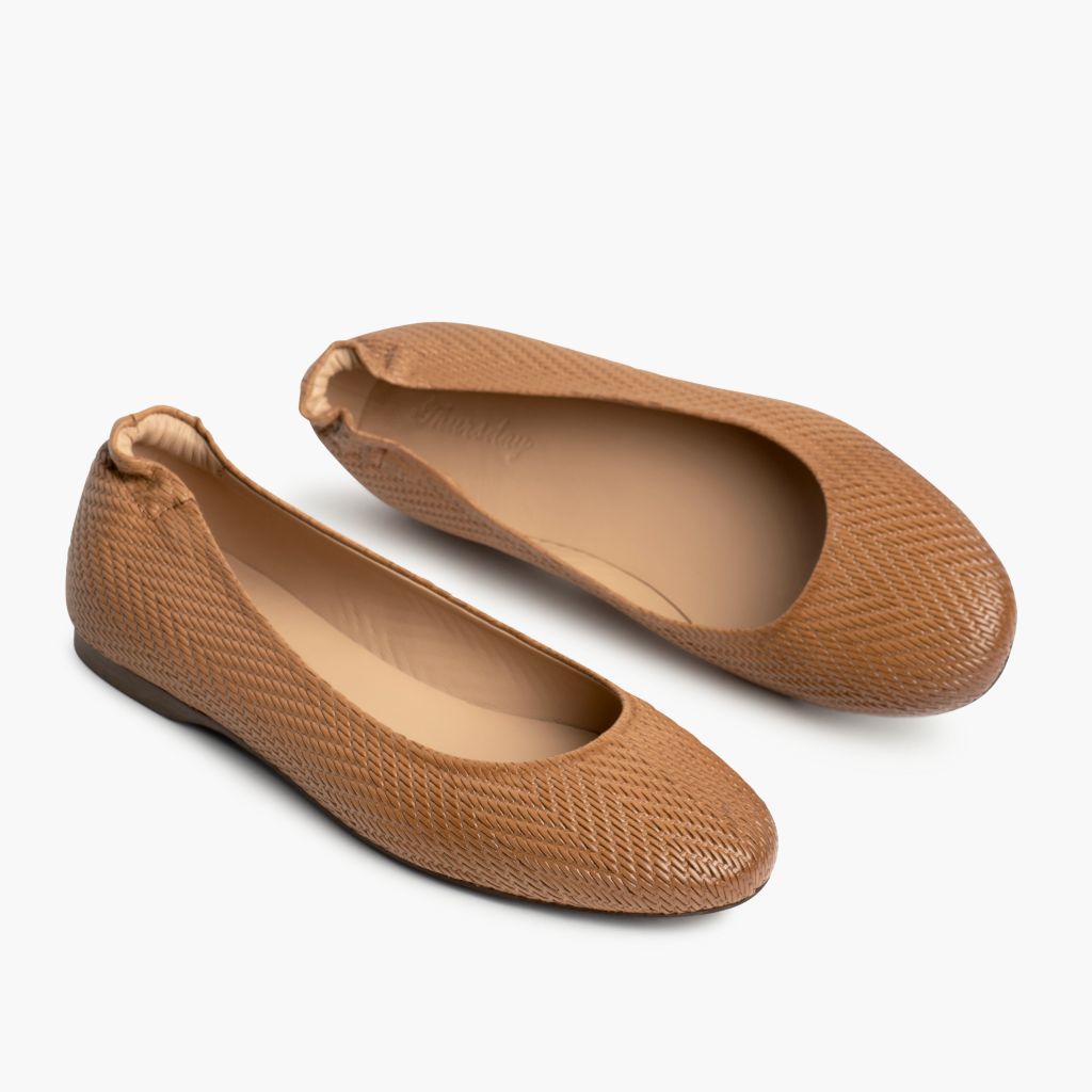 https://cdn.shopify.com/s/files/1/0419/1525/files/1024x1024-Womens-Scrunch-TanEmbossed-060123-FlatlayAlt.jpg?v=1689014809